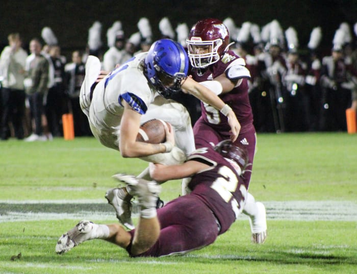 Riley Trujillo dives for extra yardage against Niceville. The Bartram Trail quarterback is equally dangerous with his legs as he is with his arm.